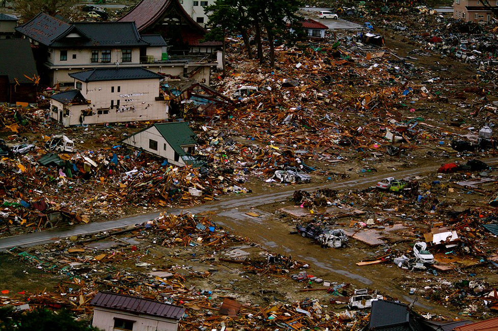 The debris of destroyed buildings after an earthquake and tsunami.