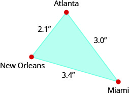 上图显示了一个三角形。 每个角度都按顺时针标记为 “亚特兰大”、“迈阿密” 和 “新奥尔良”。 从亚特兰大延伸到迈阿密的一侧标有 3 英寸。 从迈阿密延伸到新奥尔良的一侧标有 3.4 英寸，从新奥尔良延伸到亚特兰大的一侧标有 2.1 英寸。