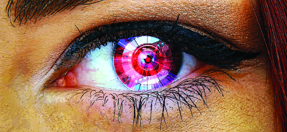 A photo of an personâ€™s eye fitted with a contact lens camera.