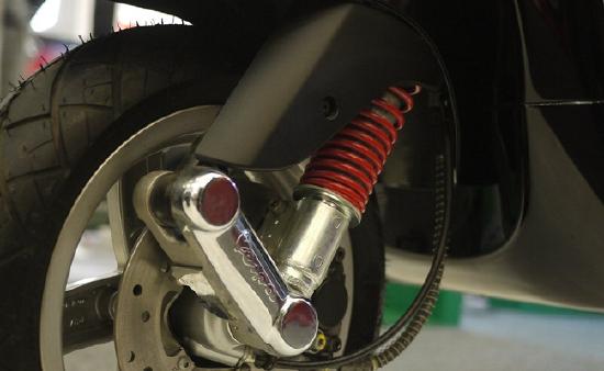 This is a picture of a shock absorber on a motorcycle.