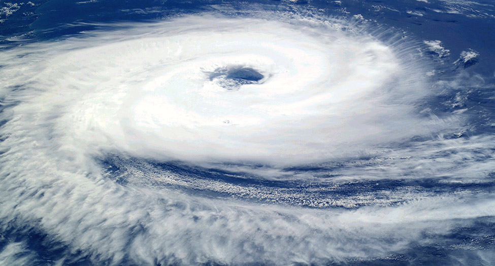 A photograph of a hurricane, showing the rotation around its eye.