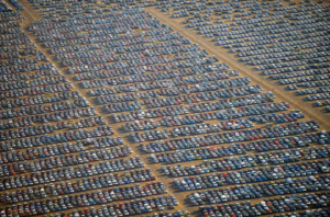 Huge parking lot full of cars.