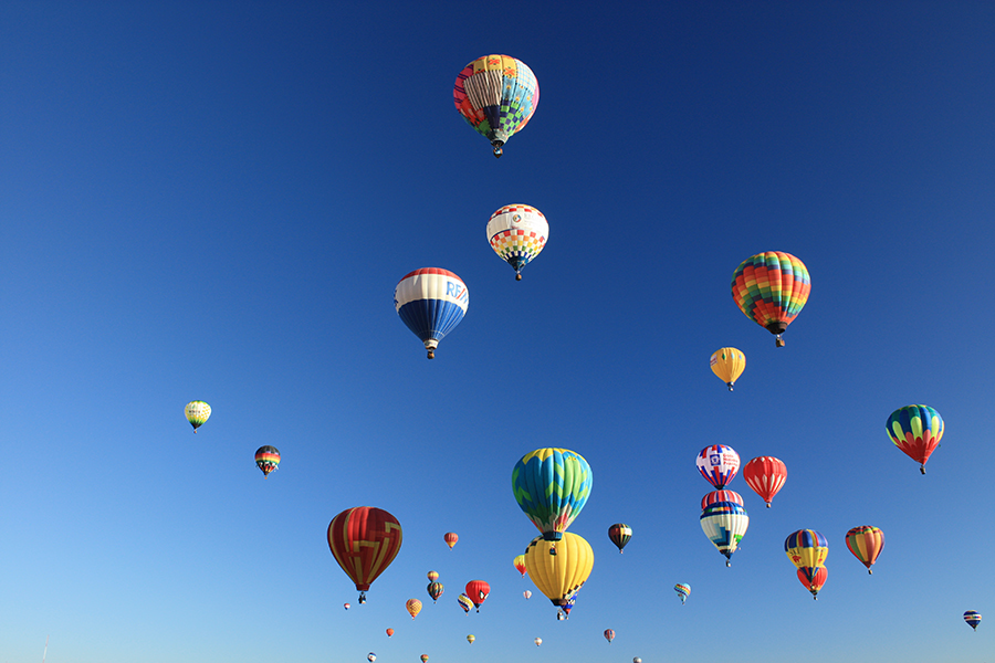 A picture of many hot air balloons.